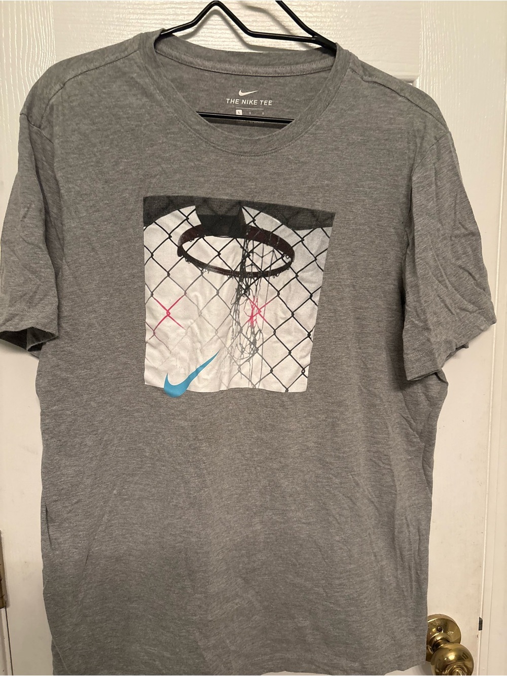 Nike Gray Short-Sleeve Basketball Graphic Tee with Blue Swoosh